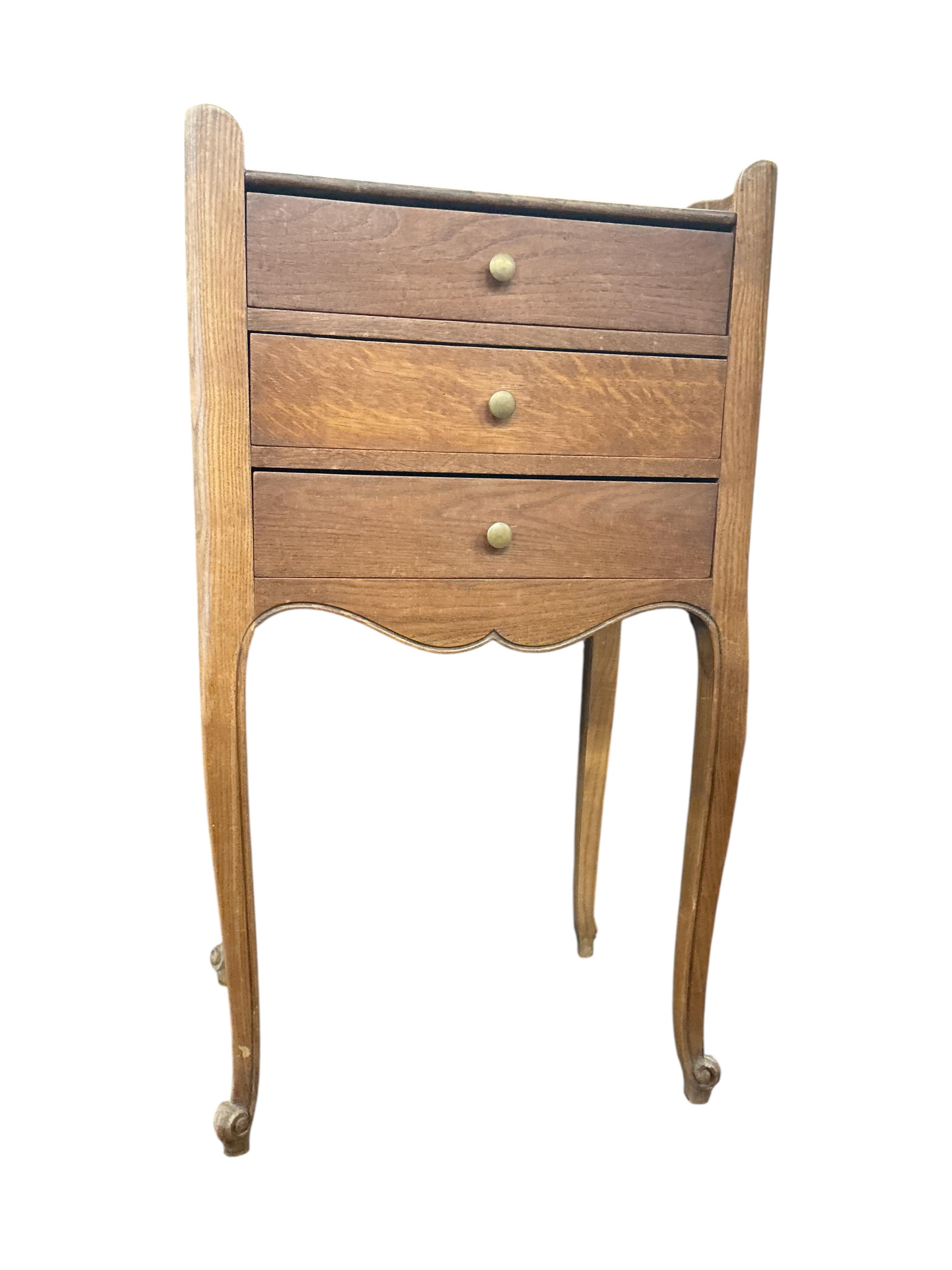 An early 20th century French oak tray top bedside chest, width 43cm, depth 32cm, height 77cm